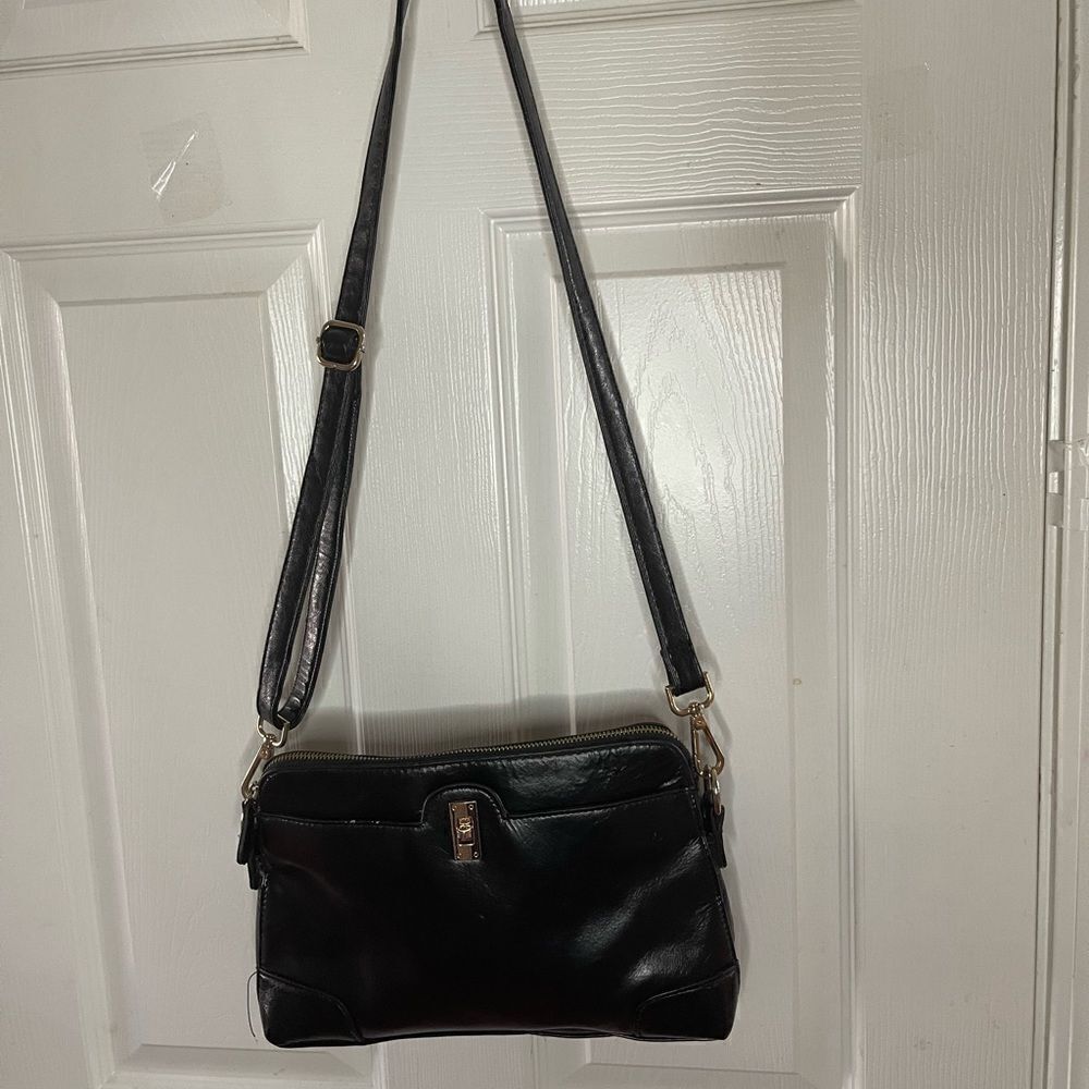 Harvé Bernard leather Black small shoulder/crossbody bag gold tone hardwares.